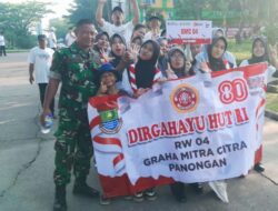 Babinsa Koramil 14/Panongan Meriahkan Jalan Santai HUT RI ke-80 di Panongan